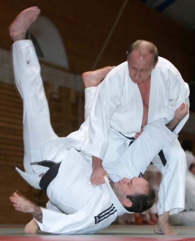 Putin demonstrating Judo move