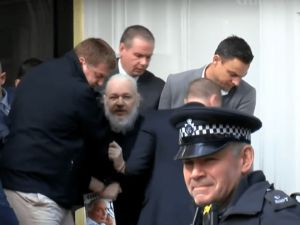 Julian Assange being arrested