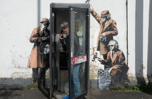 Banksy telephone booth spies