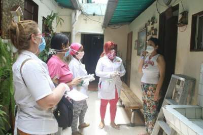 doctors conducting house visit