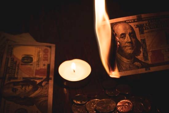 burning money to keep warm