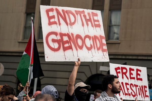 "End the genocide" protest sign